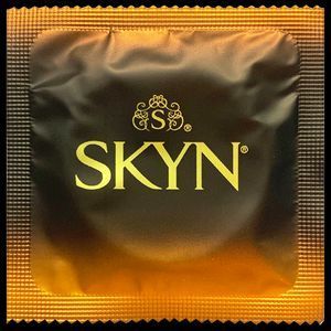 Презервативи LifeStyles SKYN ELITE LARGE ПАКОВАННЯ 12 ШТ 77 фото
